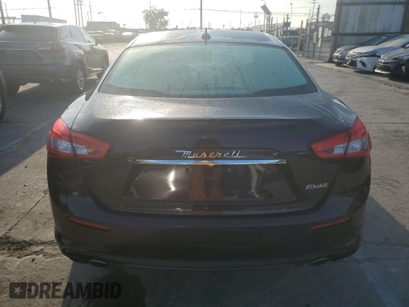 2018 Maserati Ghibli with VIN ZAM57XSA0J1286682, listed as a Copart auction lot 65457315 with 50,169 mi miles and Salvage title. Bid and sale history available at DreamBid. Image 6.