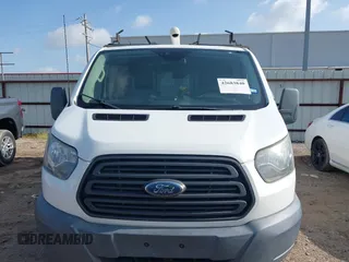 2018 Ford Transit z VIN 1FTYE1ZMXJKA11190, wystawiony jako IAAI lot #42683840 z przebiegiem 175 427 mil mil oraz . Historia ofert i sprzedaży dostępna na DreamBid. Obrazek 13.