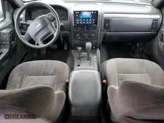 2001 Jeep Grand Cherokee Laredo with VIN 1J4GW48SX1C607432, listed as a Copart auction lot 51649365 with 296,308 mi miles and Salvage Title. Bid and sale history available at carsss.com. Image 8.