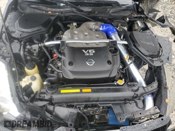 2004 Nissan 350Z Touring with VIN JN1AZ34D04T160475, listed as a Copart auction lot 59435035 with 122,875 mi miles and Salvage title. Bid and sale history available at DreamBid. Image 11.