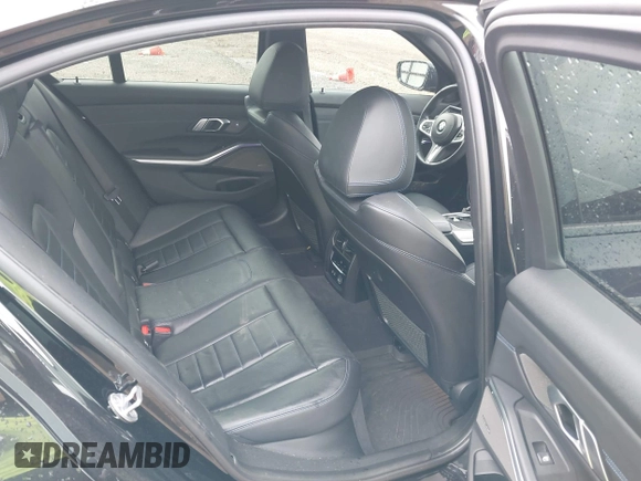 2019 BMW 3 Series 330i with VIN WBA5R1C51KAE82094, listed as a IAAI auction lot 39040815 with 66,344 mi miles and . Bid and sale history available at DreamBid. Image 8.