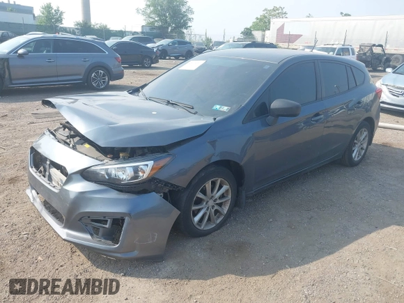 2018 Subaru Impreza with VIN 4S3GTAA63J3748319, listed as a IAAI auction lot 42441310 with 71,616 mi miles and . Bid and sale history available at DreamBid. Image 17.