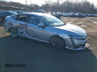 2018 Honda Clarity z VIN JHMZC5F14JC022299, wystawiony jako IAAI lot #41212872 z przebiegiem 70 434 mil mil oraz . Historia ofert i sprzedaży dostępna na DreamBid. Obrazek 1.