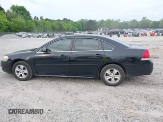 2013 Chevrolet Impala LS with VIN 2G1WF5E37D1255918, listed as a IAAI auction lot 42076395 with 118,131 mi miles and . Bid and sale history available at DreamBid. Image 14.