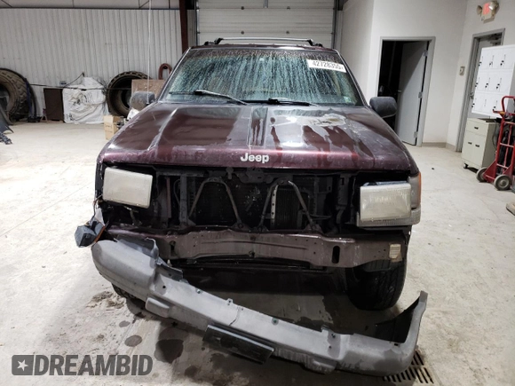 1997 Jeep Grand Cherokee Laredo with VIN 1J4GZ58S6VC573007, listed as a Copart auction lot 42728355 with 164,269 mi miles and Salvage Title. Bid and sale history available at carsss.com. Image 5.