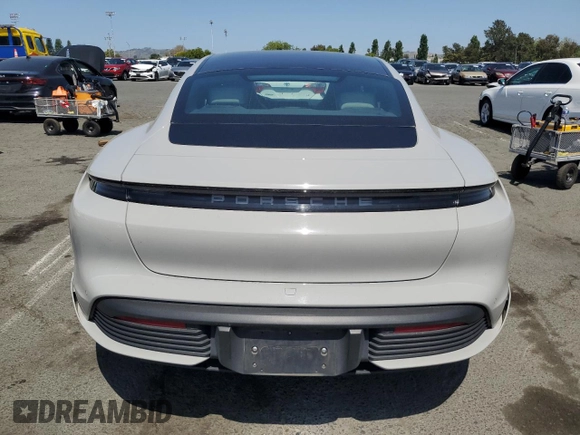 2023 Porsche Taycan z VIN WP0AA2Y16PSA13332, wystawiony jako Copart lot #55297385 z przebiegiem 18 822 mil mil oraz Szkoda całkowita • Salvage title. Historia ofert i sprzedaży dostępna na DreamBid. Obrazek 6.