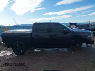 2012 Ram 1500 Tradesman with VIN 1C6RD7KP9CS232482, listed as a IAAI auction lot 41878529 with 107,410 mi miles and . Bid and sale history available at DreamBid. Image 14.