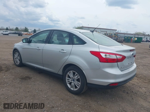 2012 Ford Focus SEL with VIN 1FAHP3H29CL300165, listed as a IAAI auction lot 42137804 with 96,644 mi miles. Bid and sale history available at carsss.com. Image 3.