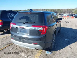 2021 GMC Acadia SLE with VIN 1GKKNKLA9MZ136112, listed as a IAAI auction lot 41212337 with 76,827 mi miles and . Bid and sale history available at DreamBid. Image 4.