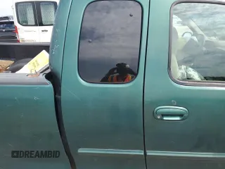 1999 Ford F-150 с VIN 1FTZX1723XNB11655, выставлен на аукционе Copart как лот 57573695 с пробегом Не указан миль и Списание • Salvage title. История ставок и продаж доступна на DreamBid. Изображение 10.