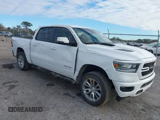 2023 Ram 1500 Laramie with VIN 1C6SRFJT1PN651510, listed as a IAAI auction lot 41406602 with 33,775 mi miles and . Bid and sale history available at DreamBid. Image 1.
