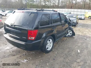 2005 Jeep Grand Cherokee Laredo with VIN 1J4GS48K85C709829, listed as a IAAI auction lot 41200259 with 1 mi miles. Bid and sale history available at carsss.com. Image 4.