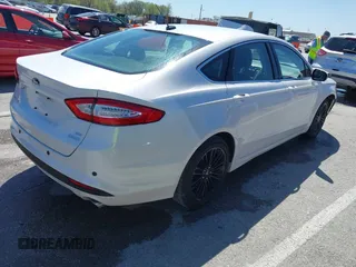 2014 Ford Fusion SE with VIN 3FA6P0HD3ER227077, listed as a IAAI auction lot 42007792 with 82,866 mi miles and . Bid and sale history available at DreamBid. Image 4.