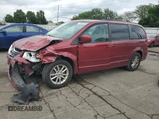 2014 Dodge Grand Caravan SXT z VIN 2C4RDGCG1ER163508, wystawiony jako Copart lot #59959295 z przebiegiem 183 306 mil mil oraz Szkoda całkowita • Salvage title. Historia ofert i sprzedaży dostępna na DreamBid. Obrazek 1.