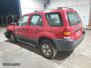 2001 Ford Escape XLS with VIN 1FMYU01181KD99269, listed as a Copart auction lot 88463335 with 217,537 mi miles and Salvage Title. Bid and sale history available at carsss.com. Image 2.