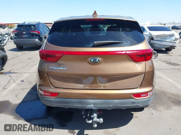 2017 Kia Sportage LX z VIN KNDPMCAC5H7121297, wystawiony jako IAAI lot #42088915 z przebiegiem 91 374 mil mil oraz . Historia ofert i sprzedaży dostępna na DreamBid. Obrazek 16.