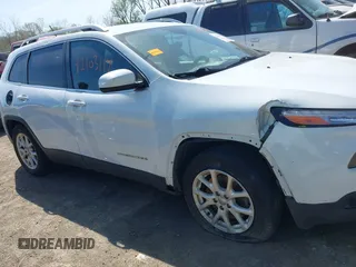 2015 Jeep Cherokee Latitude with VIN 1C4PJLCBXFW506502, listed as a IAAI auction lot 42103117 with 160,433 mi miles and . Bid and sale history available at carsss.com. Image 14.