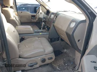 2005 Ford F-150 XLT with VIN 1FTPW12575KC65392, listed as a IAAI auction lot 41945648 with 265,153 mi miles. Bid and sale history available at carsss.com. Image 5.