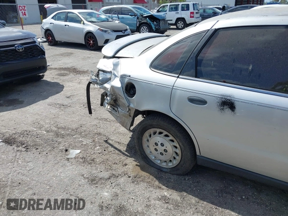 2002 Saturn LS z VIN 1G8JS54F92Y595651, wystawiony jako IAAI lot #41569902 z przebiegiem Nie podano mil oraz . Historia ofert i sprzedaży dostępna na DreamBid. Obrazek 13.