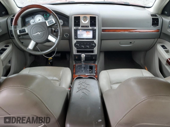 2010 Chrysler 300 with VIN 2C3CA6CT1AH141373, listed as a Copart auction lot 45304225 with 221,344 mi miles and Salvage Title. Bid and sale history available at carsss.com. Image 8.