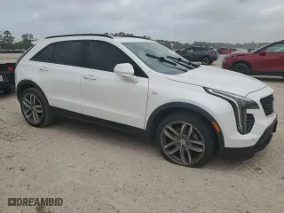 2019 Cadillac XT4 FWD Sport with VIN 1GYFZER41KF190386, listed as a Copart auction lot 52015865 with 207,731 mi miles and Clean Title. Bid and sale history available at carsss.com. Image 4.