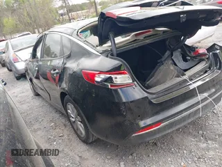 2018 Kia Optima LX z VIN 5XXGT4L33JG267863, wystawiony jako IAAI lot #41948493 z przebiegiem 71 123 mil mil oraz . Historia ofert i sprzedaży dostępna na DreamBid. Obrazek 3.