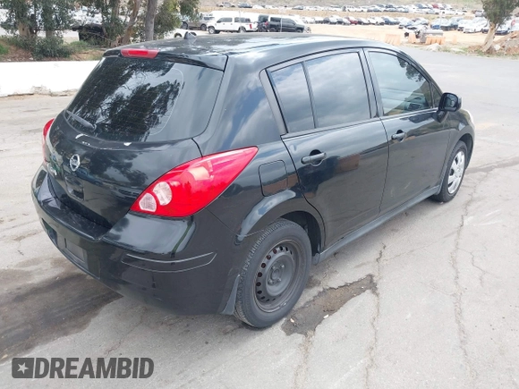 2009 Nissan Versa 1.8 S with VIN 3N1BC13E59L498728, listed as a IAAI auction lot 42110714 with 158,811 mi miles. Bid and sale history available at carsss.com. Image 4.