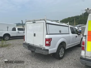 2019 Ford F-150 XL z VIN 1FTEX1C48KKE41467, wystawiony jako IAAI lot #42518514 z przebiegiem 107 651 mil mil oraz . Historia ofert i sprzedaży dostępna na DreamBid. Obrazek 4.