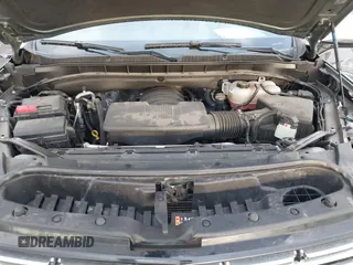 2023 Chevrolet Suburban Premier z VIN 1GNSCFKD7PR519997, wystawiony jako IAAI lot #41832769 z przebiegiem 49 419 mil mil oraz . Historia ofert i sprzedaży dostępna na DreamBid. Obrazek 10.