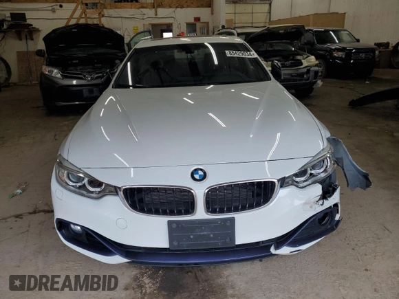 2014 BMW 4 Series 428i xDrive with VIN WBA3N5C52EF715673, listed as a Copart auction lot 85429034 with 74,547 mi miles and Salvage Title. Bid and sale history available at DreamBid. Image 5.