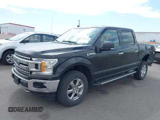 2018 Ford F-150 XL with VIN 1FTEW1EP6JKC24542, listed as a IAAI auction lot 42283242 with 127,608 mi miles and . Bid and sale history available at DreamBid. Image 2.