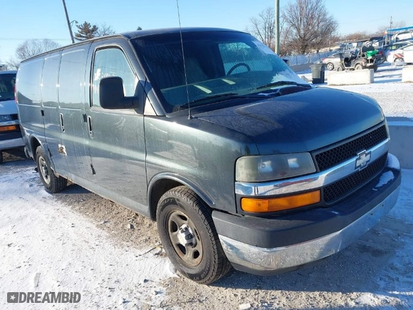 2004 Chevrolet Express Cargo Van with VIN 1GCFG15X041126375, listed as a IAAI auction lot 41413032 with 154,523 mi miles. Bid and sale history available at carsss.com. Image 1.