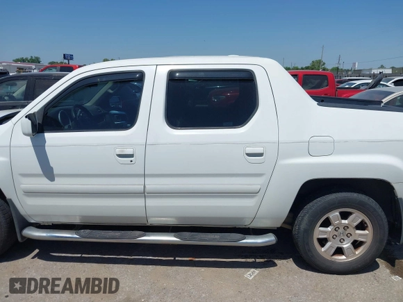 2008 Honda Ridgeline RTL z VIN 2HJYK16568H529221, wystawiony jako IAAI lot #42027640 z przebiegiem 143 536 mil mil oraz . Historia ofert i sprzedaży dostępna na DreamBid. Obrazek 14.