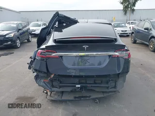 2016 Tesla Model X 70D with VIN 5YJXCAE27GF015175, listed as a IAAI auction lot 41074929 with 115,130 mi miles. Bid and sale history available at carsss.com. Image 17.