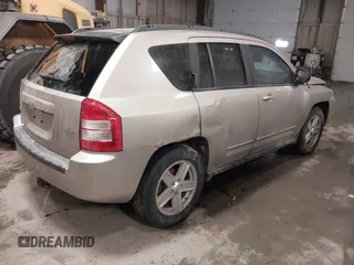 2010 Jeep Compass Sport with VIN 1J4NF4FB7AD501587, listed as a IAAI auction lot 41514419 with 154,826 mi miles. Bid and sale history available at carsss.com. Image 4.