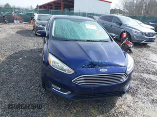 2017 Ford Focus Titanium with VIN 1FADP3N25HL272276, listed as a IAAI auction lot 41630327 with 110,899 mi miles and . Bid and sale history available at DreamBid. Image 12.