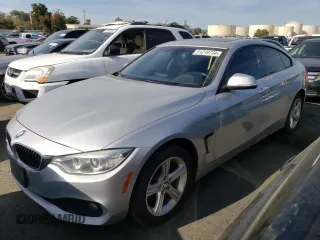 2015 BMW 4 Series 428i xDrive with VIN WBA4C9C52FG135501, listed as a Copart auction lot 51219774 with 104,333 mi miles and Salvage Title. Bid and sale history available at carsss.com. Image 1.