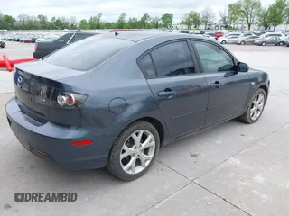 2009 Mazda Mazda3 i Touring Value with VIN JM1BK32F691204055, listed as a IAAI auction lot 42152273 with 252,960 mi miles. Bid and sale history available at carsss.com. Image 4.