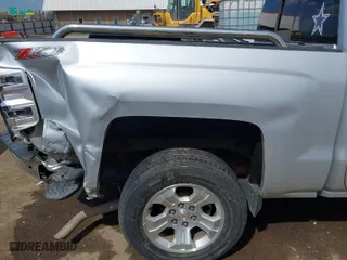 2014 Chevrolet Silverado 1500 LT with VIN 3GCUKREC3EG101975, listed as a IAAI auction lot 41868152 with 221,738 mi miles. Bid and sale history available at carsss.com. Image 6.
