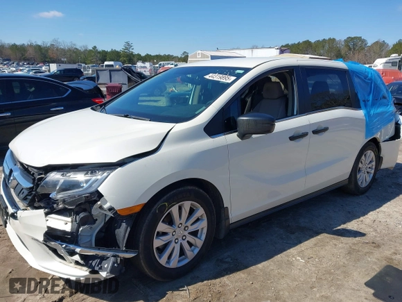 2019 Honda Odyssey LX with VIN 5FNRL6H23KB049236, listed as a IAAI auction lot 41633339 with 96,000 mi miles and . Bid and sale history available at DreamBid. Image 17.
