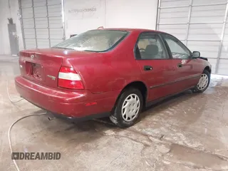1994 Honda Accord DX with VIN 1HGCD562XRA176098, listed as a IAAI auction lot 41228156 with 113,553 mi miles. Bid and sale history available at carsss.com. Image 4.