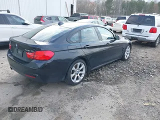 2016 BMW 4 Series 428i xDrive with VIN WBA4C9C52GG136584, listed as a IAAI auction lot 41530110 with 124,667 mi miles and . Bid and sale history available at carsss.com. Image 4.