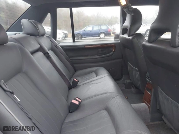 1998 Volvo S90 with VIN YV1KS9600W1129240, listed as a IAAI auction lot 41564419 with 131,225 mi miles. Bid and sale history available at carsss.com. Image 8.