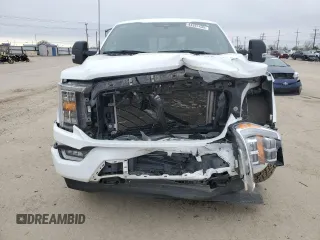 2023 Ford F-150 XL with VIN 1FTFW1E80PFB21597, listed as a Copart auction lot 44261435 with 55,566 mi miles and Salvage Title. Bid and sale history available at carsss.com. Image 5.