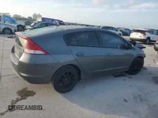 2010 Honda Insight EX with VIN JHMZE2H72AS025427, listed as a Copart auction lot 54983775 with 184,052 mi miles and Salvage Title. Bid and sale history available at DreamBid. Image 3.