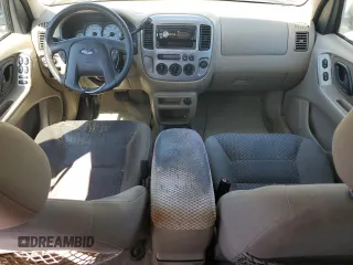 2004 Ford Escape XLT with VIN 1FMYU03104KA53587, listed as a Copart auction lot 51777385 with 154,102 mi miles and Salvage Title. Bid and sale history available at carsss.com. Image 8.