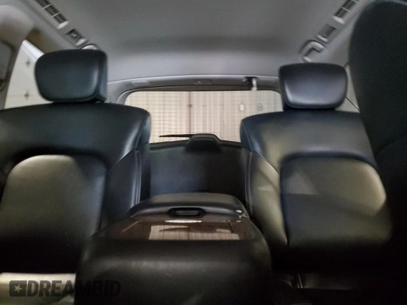 2015 Infiniti QX80 with VIN JN8AZ2NE7F9080402, listed as a Copart auction lot 52141295 with 0 mi miles and Salvage Title. Bid and sale history available at carsss.com. Image 10.