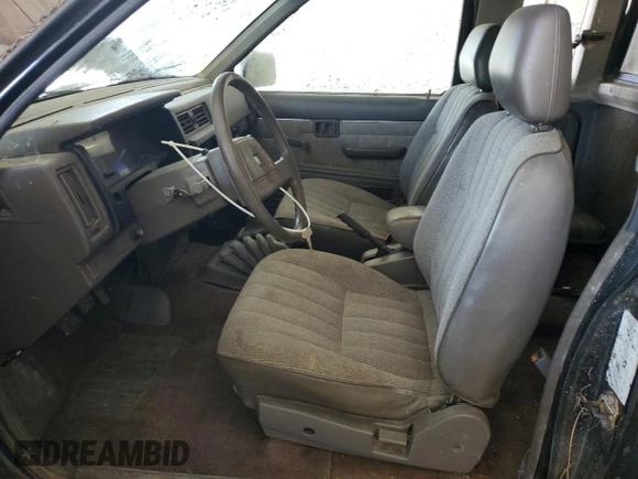 1986 Nissan Hardbody E z VIN 1N6ND16Y7GC413942, wystawiony jako Copart lot #57677605 z przebiegiem 126 183 mil mil oraz Tytuł czysty. Historia ofert i sprzedaży dostępna na DreamBid. Obrazek 7.