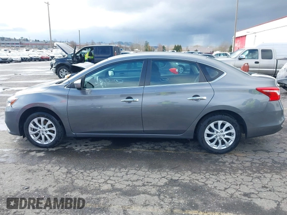2019 Nissan Sentra SV with VIN 3N1AB7AP5KY357883, listed as a IAAI auction lot 41783436 with 89,636 mi miles and . Bid and sale history available at DreamBid. Image 14.
