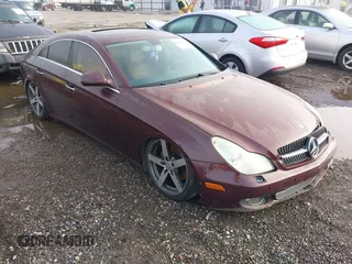 2009 Mercedes-Benz CLS-Class 5.5L with VIN WDDDJ72X49A146979, listed as a IAAI auction lot 41871094 with 143,458 mi miles. Bid and sale history available at carsss.com. Image 1.